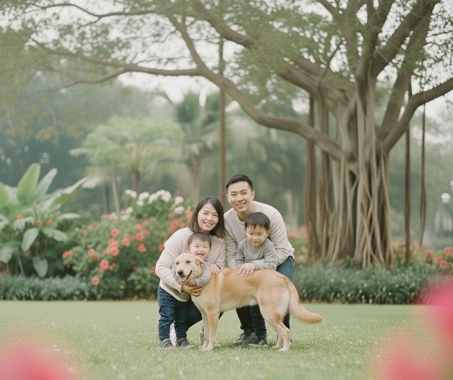 Family photo of a young family with their adopted Tong Gau