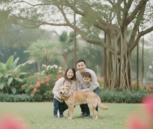 Family photo of a young family with their adopted Tong Gau